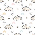Seamless nursery pattern clouds and rainbow cute textures for baby bedding, fabrics, wallpaper, wrapping paper, textiles