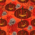 Seamless orange background with pumpkins for Halloween. Royalty Free Stock Photo