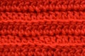 A seamless orange crocheted texture
