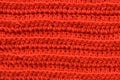 A seamless orange crocheted texture