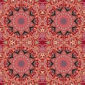 Seamless ornamental pattern with flower mandala in warm tones. Indian, arabian motives. Square carpet, ethnic shawl