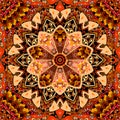 Seamless ornamental pattern with patchwork mandala flower in warm tones. Print for fabric, carpet, cushion, wrapping design