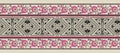 seamless Paisley border pattern on black background. Hibiscus flower border with traditional Asian design elements Royalty Free Stock Photo