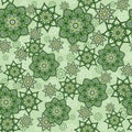 Seamless paisley mandala pattern with folk geometric flowers. Indian stylized floral texture for textile or wrap.