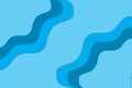 Seamless light blue paper cut background with darker blue flowing wavy lines creating abstract pattern Royalty Free Stock Photo