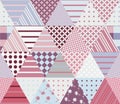 Seamless patchwork pattern from different triangle patches. Royalty Free Stock Photo