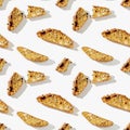 Seamless patterm from traditional Italian almond biscotti cookies close up. Homemade sweet cantuccini