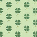 The seamless pattern with the abstract clover on the green background Royalty Free Stock Photo