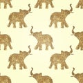Seamless pattern with abstract elephants of glitter. Their trunks raised up - good luck symbol