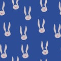 Seamless pattern abstract rabbit funny muzzles on blue background. Cute bunny heads kid painting print, vector eps 10