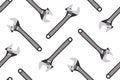 Seamless pattern of adjustable wrenches on a white background. Vector