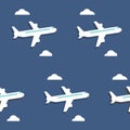 Seamless pattern. Airplanes and clouds over blue background.