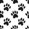 Seamless pattern with animal paw prints. Royalty Free Stock Photo