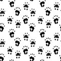 Seamless pattern with animal's footprint. Black imprint of groundhog foot on white background.