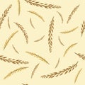 Seamless pattern with autumn golden and yellow branches on a beige background
