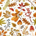 Seamless pattern with autumn leaves and tree branches. Repeatable background with fall mushrooms, chestnut, berries Royalty Free Stock Photo