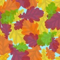 Seamless pattern with autumn oak leaves. Multi-colored vector ornament on blue for textiles, paper, plastic and web pages