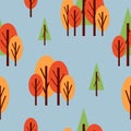 Seamless pattern with autumn trees. Red, green and orange. Gray background. Cartoon flat style. Garden or forest. Nature and Royalty Free Stock Photo