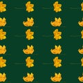 Seamless pattern with autumn yellow leaves on green dark color
