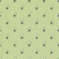 Seamless pattern avocado on a green background.