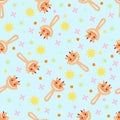 Seamless pattern with baby cow rattle. Children\'s pattern on textiles. Gentle children\'s blue background Royalty Free Stock Photo