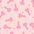Seamless pattern with baby pig rattle. Children's pattern on textiles. Gentle children's pink background Royalty Free Stock Photo