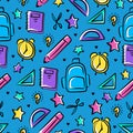 Seamless pattern in back to school theme with star, book, bag. scissor, ruler, pencil; alarm clock, bulb lamp isolated blue