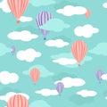 Seamless pattern with baloons in blue cloudy sky Royalty Free Stock Photo