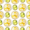 Seamless pattern of banana and cucumber slices on a white background Royalty Free Stock Photo