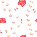 Seamless pattern with beige animal stepps and red cones Royalty Free Stock Photo