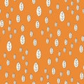 Seamless pattern from beige leaves. Strict flat design. Geometric background. Printing on fabric, wrapping paper. Vector