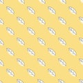 Seamless pattern of beige leaves on a yellow background. Strict flat design. Geometric location. Natural eco motive