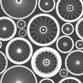 Seamless pattern with bicycle wheels. Bike rubber tyre silhouettes. Fitness cycle, road and mountain bike. Vector Royalty Free Stock Photo