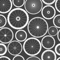 Seamless pattern with bicycle wheels. Bike rubber tyre silhouettes. Fitness cycle, road and mountain bike. Vector Royalty Free Stock Photo