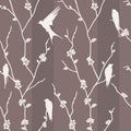 Seamless pattern with bird on sakura branches Royalty Free Stock Photo