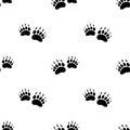 Seamless pattern with black bear trace. Vector flat illustration