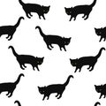 Seamless pattern black cats with green glowing eyes on white, vector eps 10 Royalty Free Stock Photo