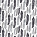 Seamless pattern with black feathers. Vector monochrome texture for wrapping or textile. Royalty Free Stock Photo