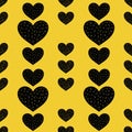 Seamless pattern with black and gold hearts on yellow background. Valentine`s Day Royalty Free Stock Photo