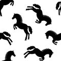 Seamless pattern with black horses isolated on white background. Vector Royalty Free Stock Photo
