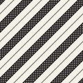 Seamless pattern in black and off white for dress, shirt, skirt, blouse, tie, gift paper, other textile print. Diagonal stripes.