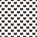 Seamless pattern with black scary Halloween Cat face with orange eyes. Background, design for fabric and decor