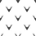 Seamless pattern with black silhouette of deer head with royal crown Royalty Free Stock Photo