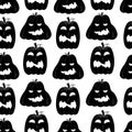 Seamless pattern with black silhouette of a pumpkin face for halloween on a white background Royalty Free Stock Photo