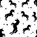 Seamless pattern with black silhouettes unicorns and stars. Vector illustration
