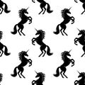 Seamless pattern with black unicorns.