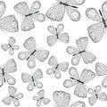 Seamless pattern with black and white butterflies