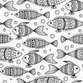 Seamless pattern of black and white fishes in doodle ink style