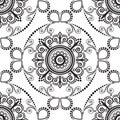 Seamless pattern with black and white mehndi lace of flower buta decoration items on white background.