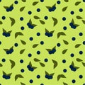 Seamless pattern: blue blueberries and green leaves on a light green background.